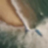 Aerial view of surfers catching waves at Mavericks Beach