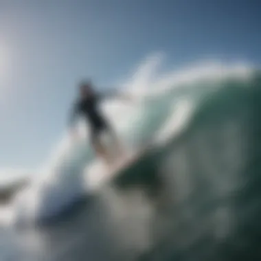 Aerial view of a surfer riding a wave