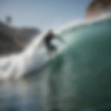 Surfer skillfully maneuvering on a wave at a popular California beach