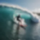 Surfer riding a massive wave at Honolii Beach Park