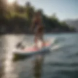 Graceful paddle boarder in motion