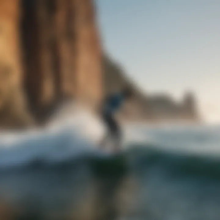 Surfer in action with Punta Roca's iconic rock formation