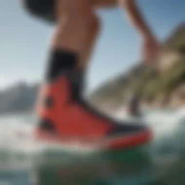 An athlete wearing Quiksilver booties while performing a water sport.