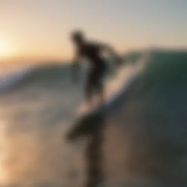 A surfer catching a wave at sunset