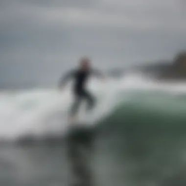 Surfers riding the waves at Rockaway Beach