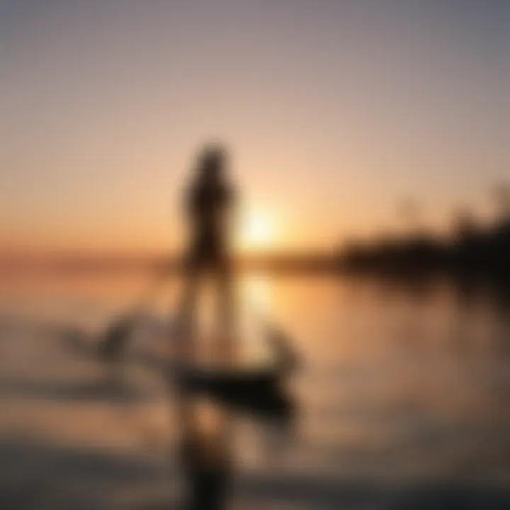 Silhouetted Paddleboarder Against Sunset Sky