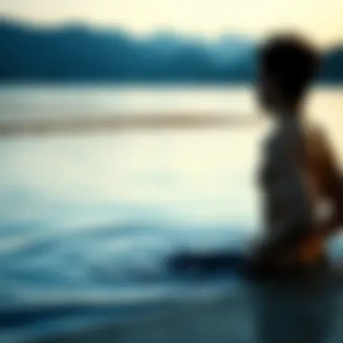 The Importance of Mental Preparation A serene scene of a swimmer meditating by the water's edge