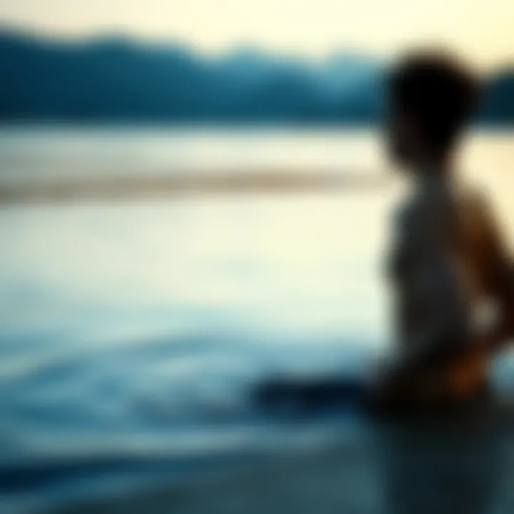 The Importance of Mental Preparation A serene scene of a swimmer meditating by the water's edge