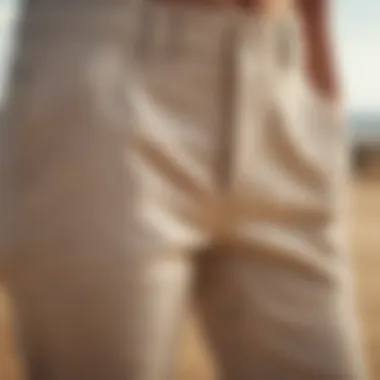 Close-up of Roxy linen pants texture against a sandy background