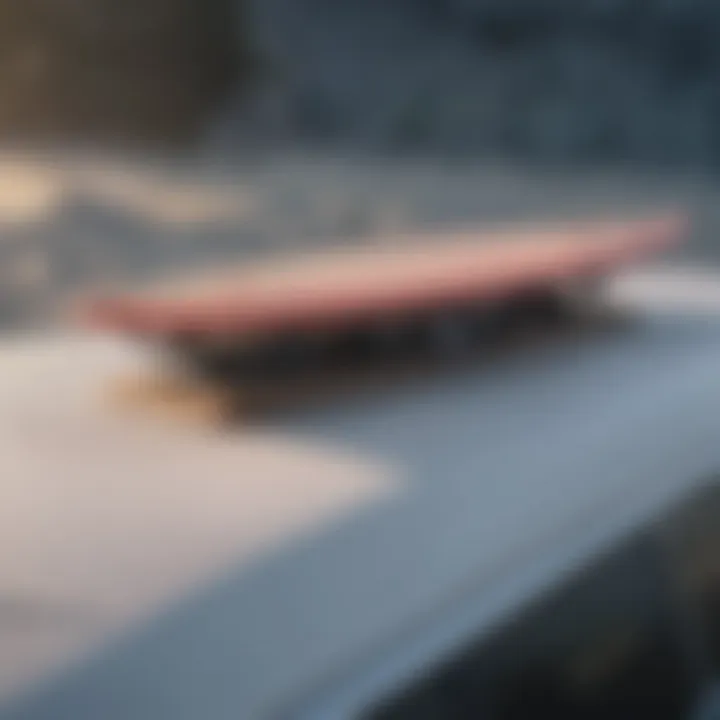 Surfboard securely strapped on a vehicle roof rack