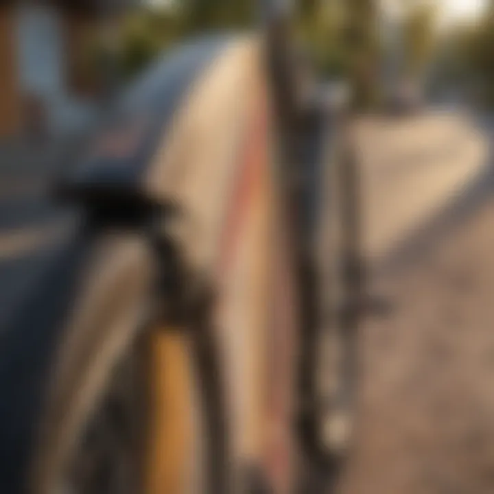 Close-up of a surfboard securely attached to a bicycle rack.