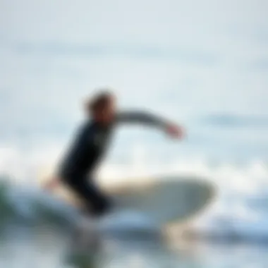 A surfer in action wearing a Rip Curl spring suit in the waves