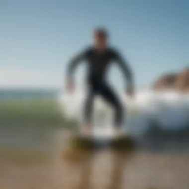 Surfer riding a wave at Guincho Beach