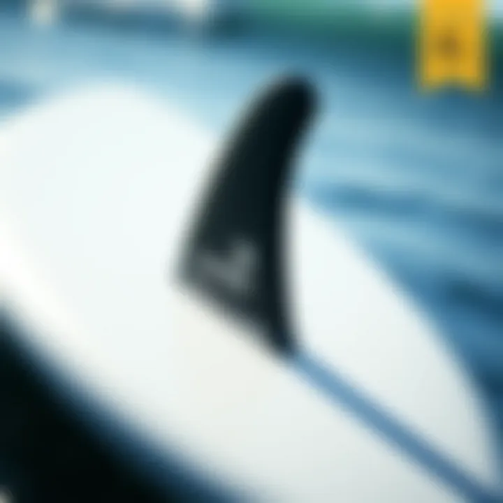 A detailed view of a high-performance surfboard showcasing its sleek design and intricate fin setup