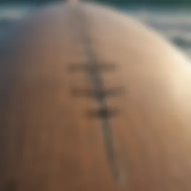 A close-up of a vintage surfboard adorned with musical notes