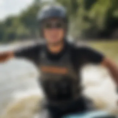 Watersports enthusiast using GoPro POV mount while wakeboarding