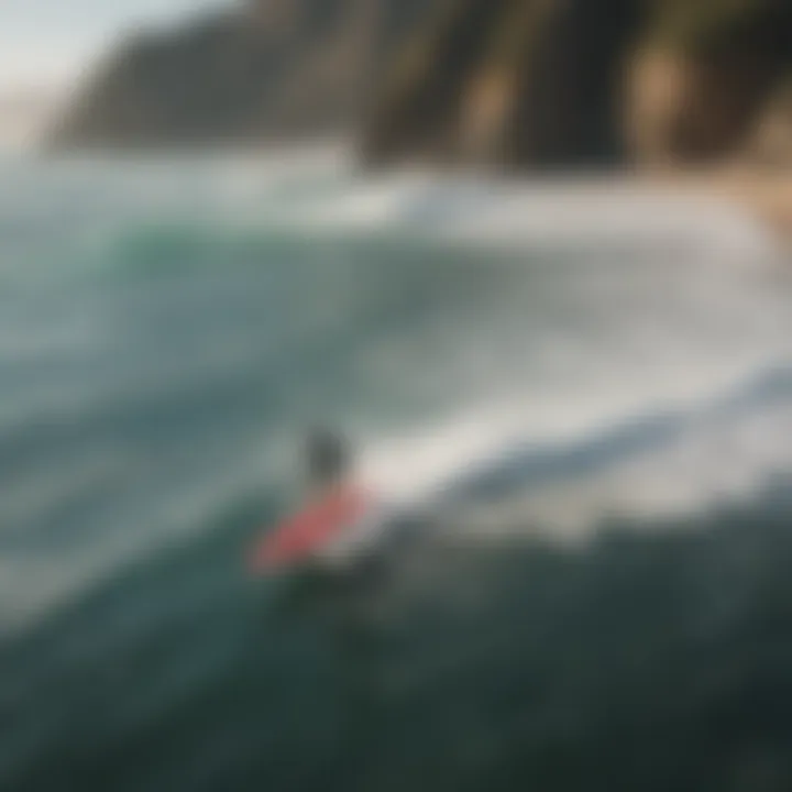 Aerial view of surfers catching waves in Mexico