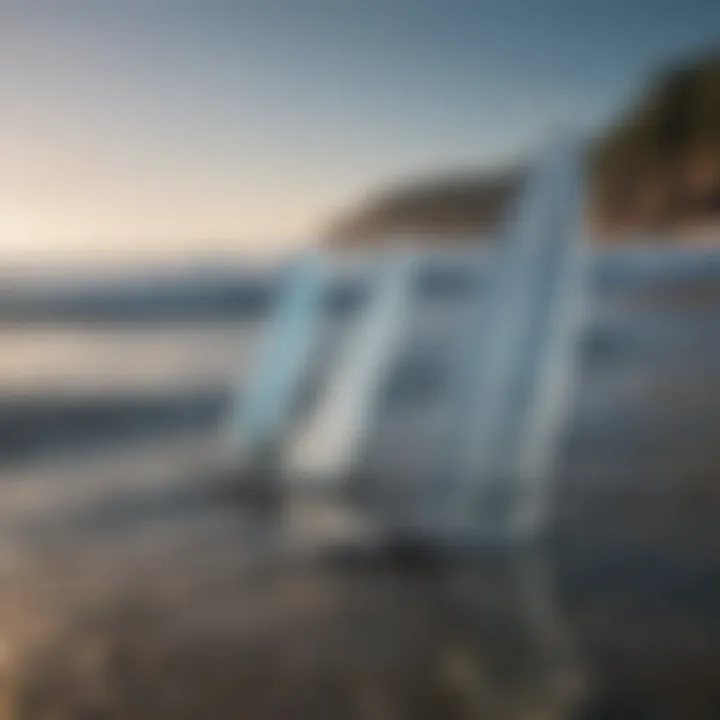 Close-up of surfboard fins in crystal clear water