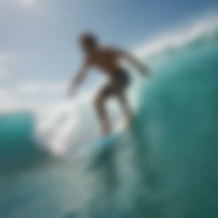 Surfer doing a stylish turn on a turquoise wave