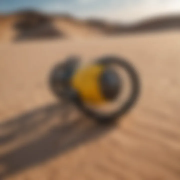 Close-up of specialized kite landboarding gear on sand dunes