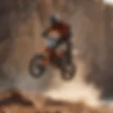 Rider performing high-speed turn on rocky cliff