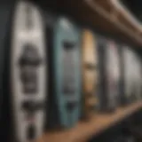 Close-up view of various wakeboard types displayed on a shelf.